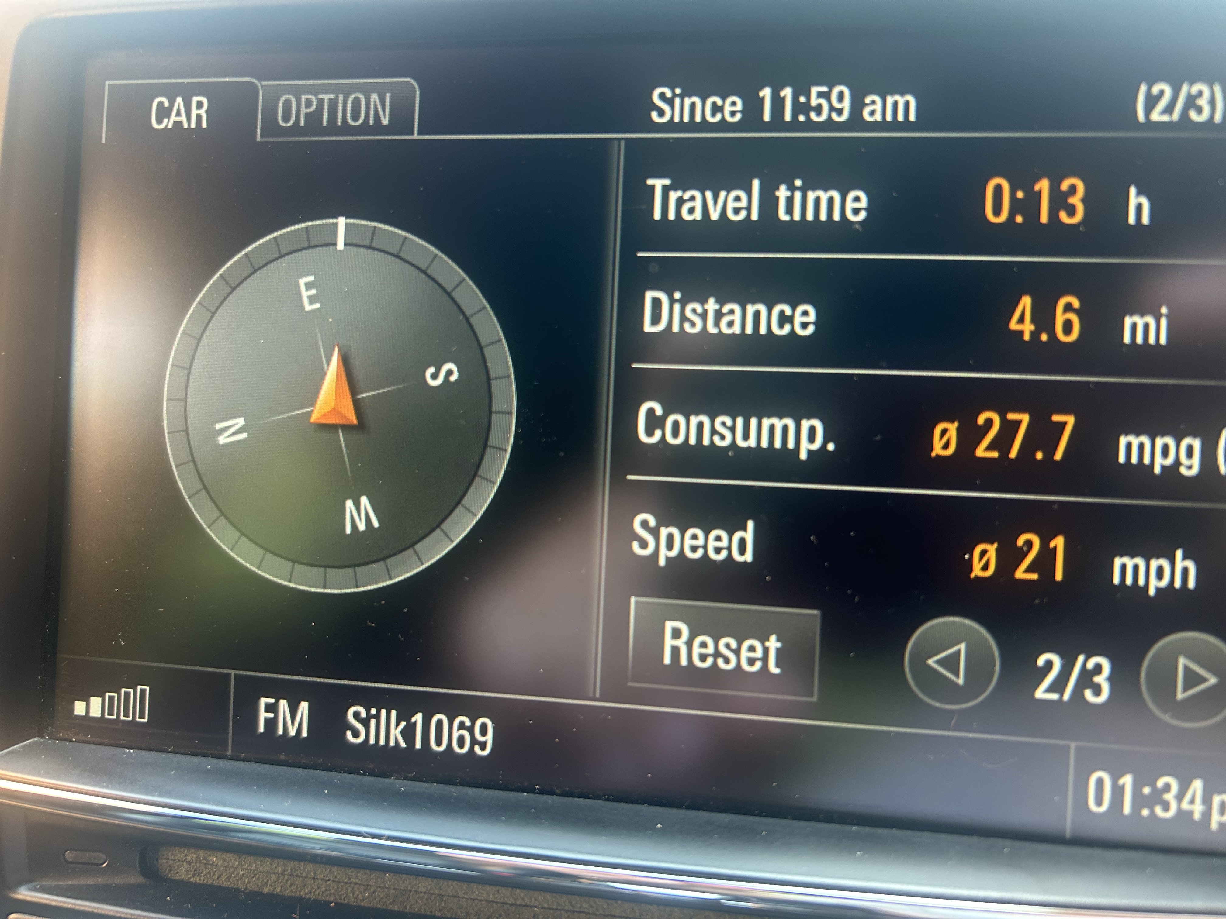 Porsche OBC screen showing trip computer and compass