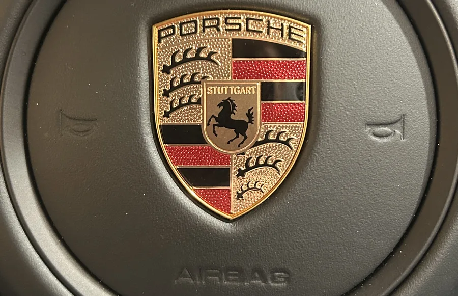 Porsche crest on the steering wheel airbag
