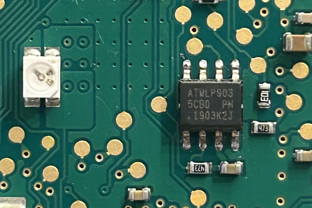 Close-up of the EEPROM memory chip on a Porsche instrument cluster circuit board